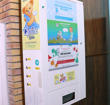 Distributeur de monnaie et lessive dans votre laverie automatique rue Davy 75017 Paris près de chez moi